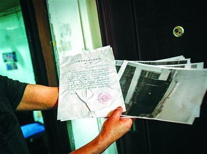 私装防盗门处罚流程要一年 官方称没有强拆权